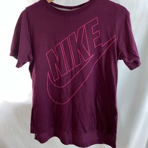 Pink Nike t-shirt.